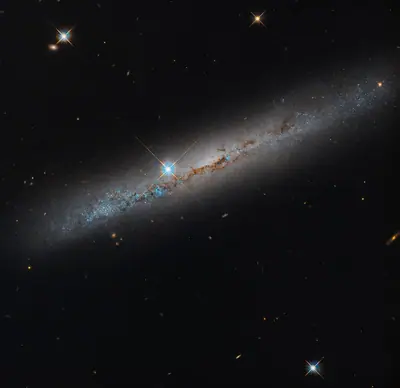 NGC 1827, Hubble telescope observation released 16 October 2026. Processed astronomical image.