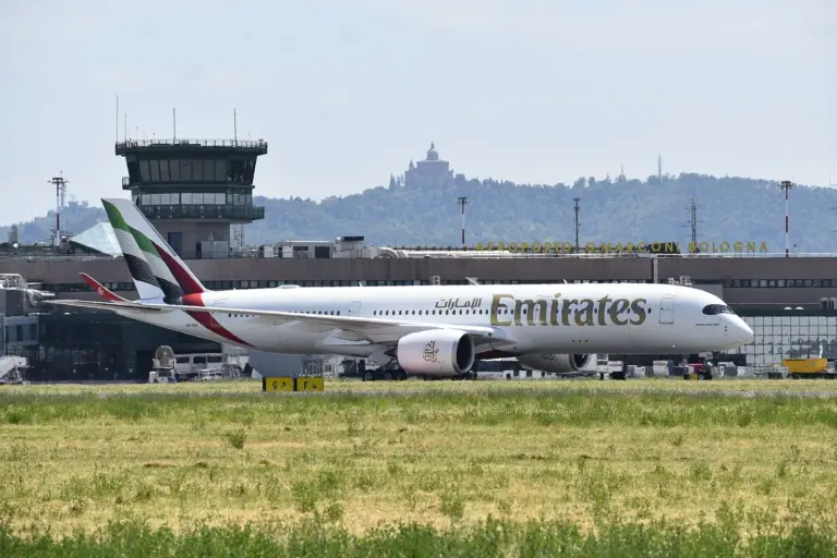 Emirates Airbus A350 in Bologna; file metadata dated 12 February 2026. Archive airline context; not the accessibility expo or a demonstration of its services.