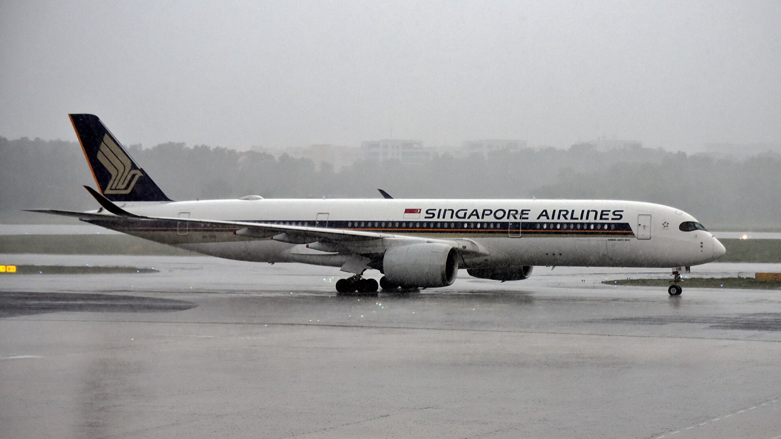 Singapore Airlines Airbus A350-941 9V-SHB at Singapore Changi Airport in heavy rain, 14 May 2024. Archive; not a Project Beacon delivery or proof of SAF use on this flight.