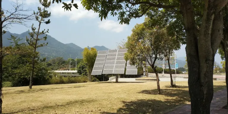 Solar panels beside the Xiyuan River in China, photographed in 2018.