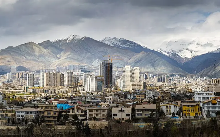 Panoramic view of Tehran with mountains in the background in 2019.